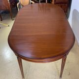 Louis XVl style round table in cherry with extensions