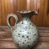 Old vintage brown stoneware pitcher