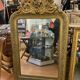 LARGE LOUIS XV STYLE ROCAILLE MIRROR IN GILT STUCCO FORAL DECOR ON PEDAL