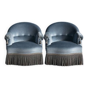 Pair of vintage blue velvet crapaud armchairs, a timeless comfort.