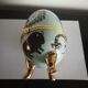 Sky blue porcelain egg box animals