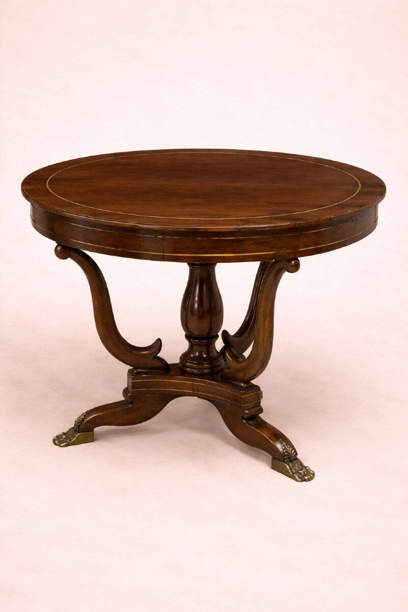Table ronde Empire – acajou avec incrustations et pieds griffes
