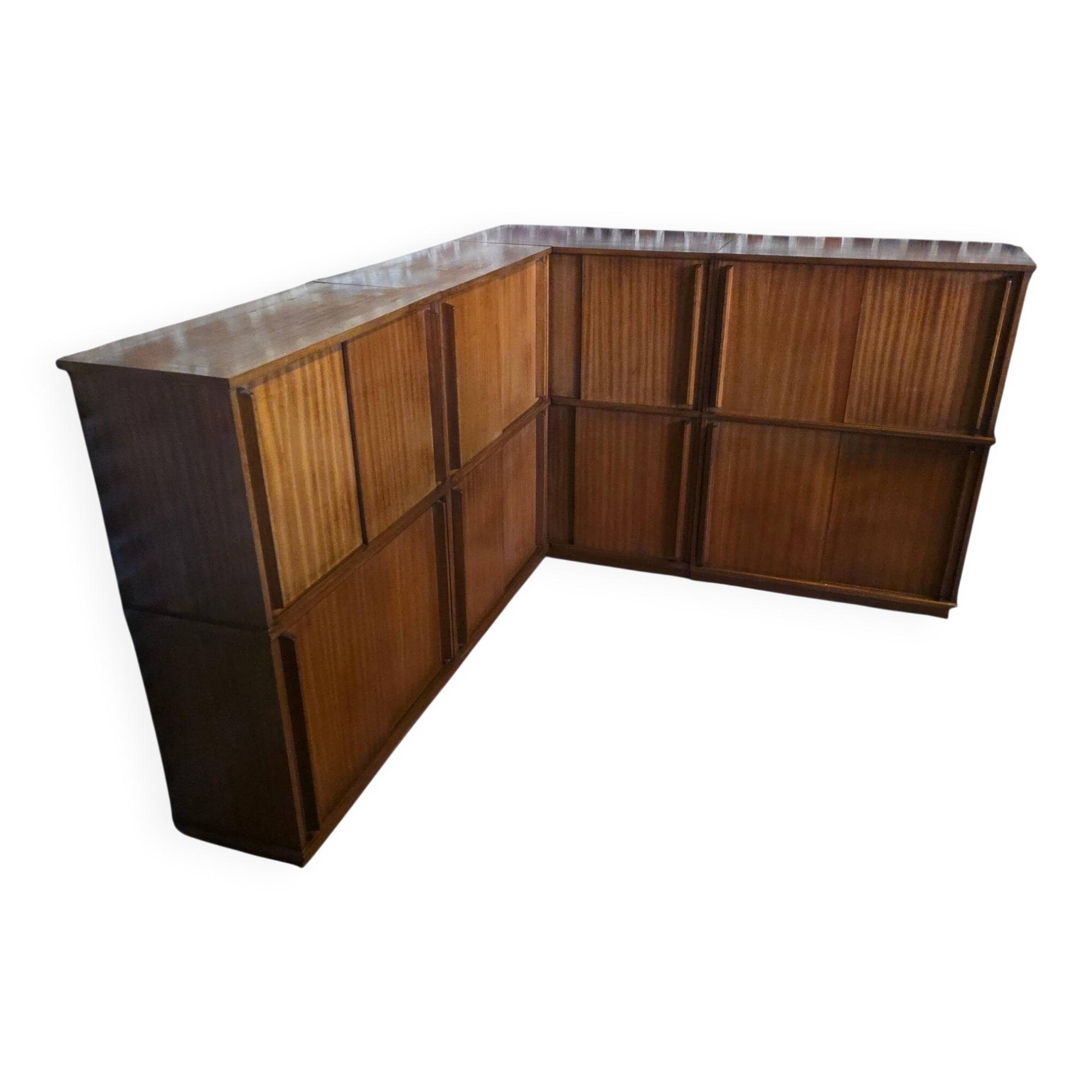 Modular corner library Oscar from the 1960s with sliding doors.