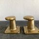 Pair of golden cast iron hooks