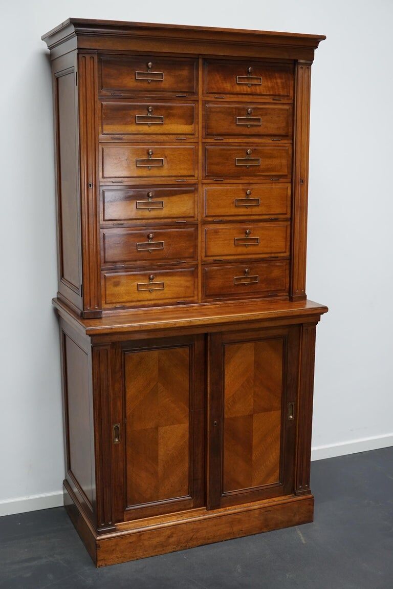 Walnut apothecary furniture France 1920s
