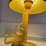 Bedside gun lamp philippe starck