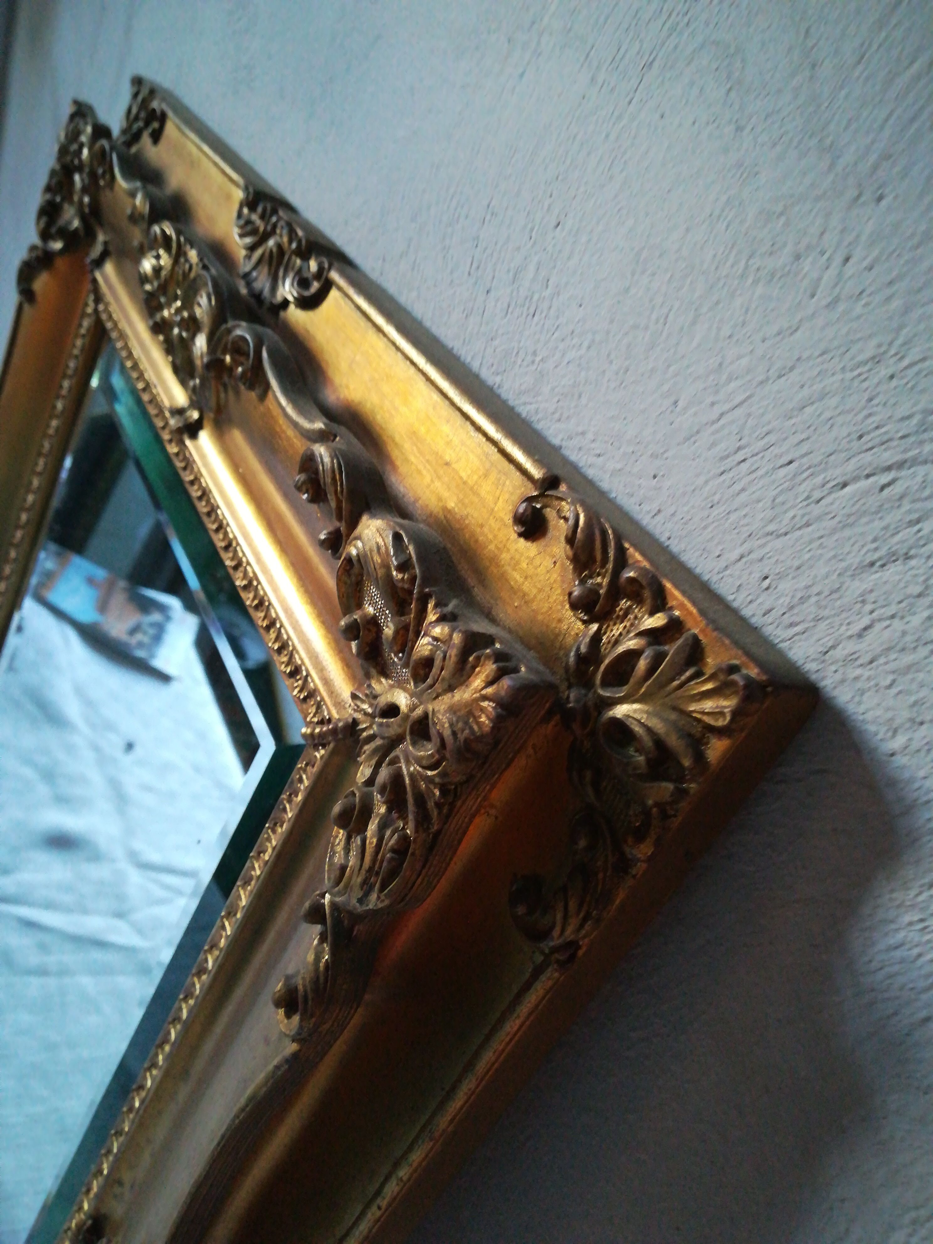 Mirror a volutes in wood and stucco 46 x 57cm