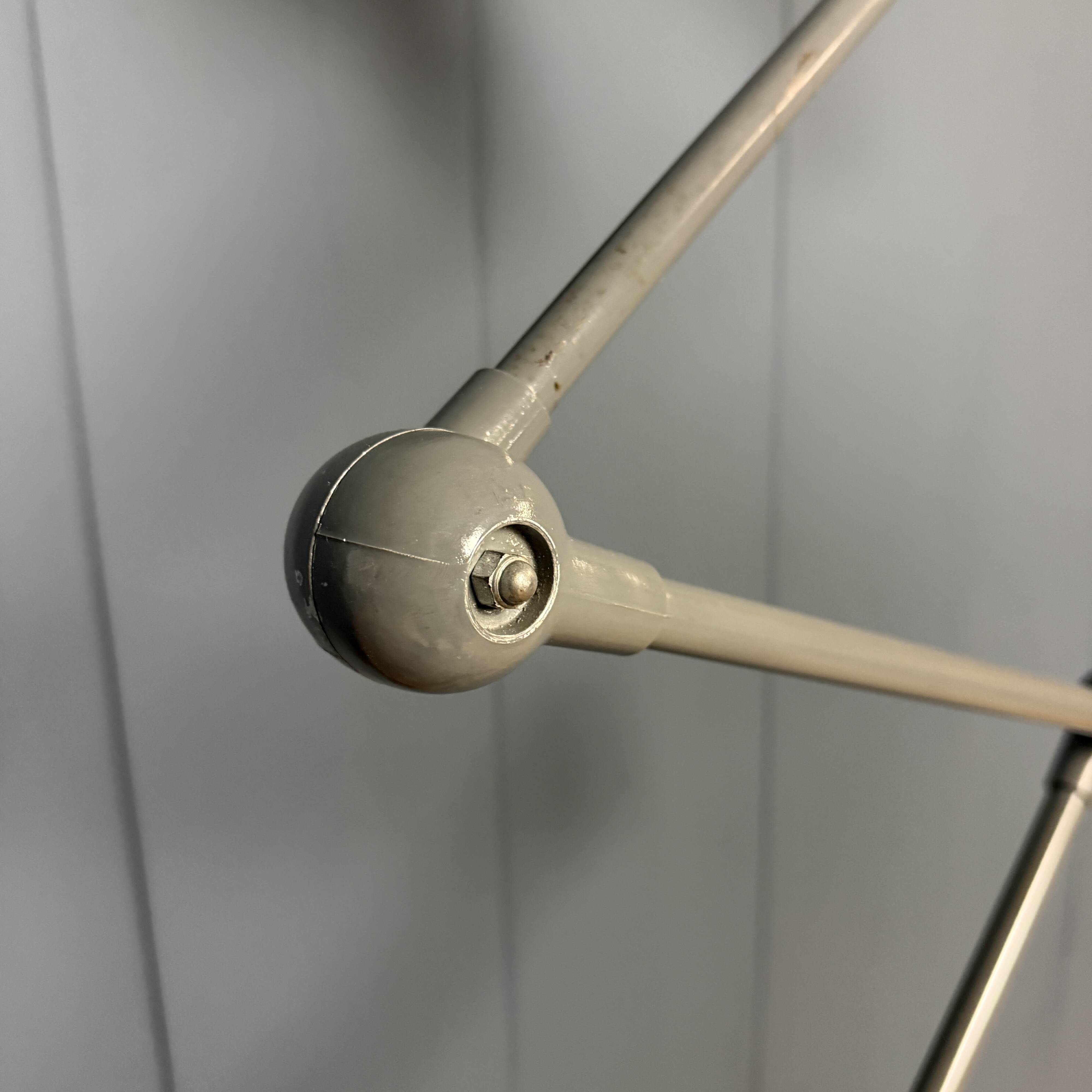 Dark grey Jielde three-arm clamp table lamp