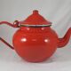 Vintage teapot coffee maker in red enameled metal
