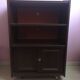 Vintage furniture, bookcase, TV or hi-fi system, sliding door with wheels