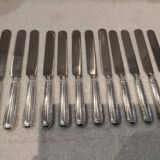 12 silver-plated Empire style table knives 25.3cm