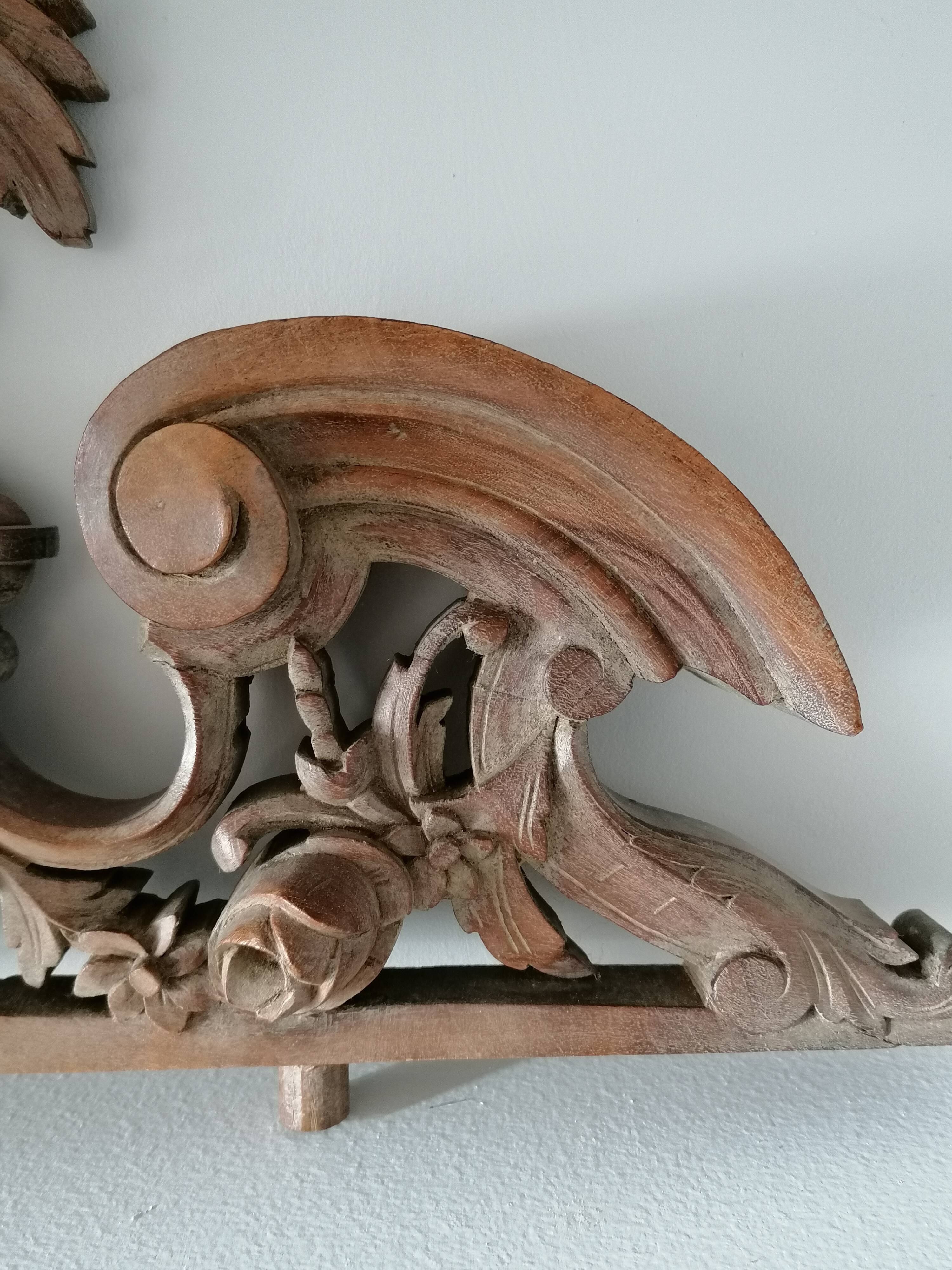 Old carved wooden pediment