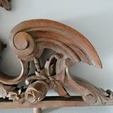Old carved wooden pediment
