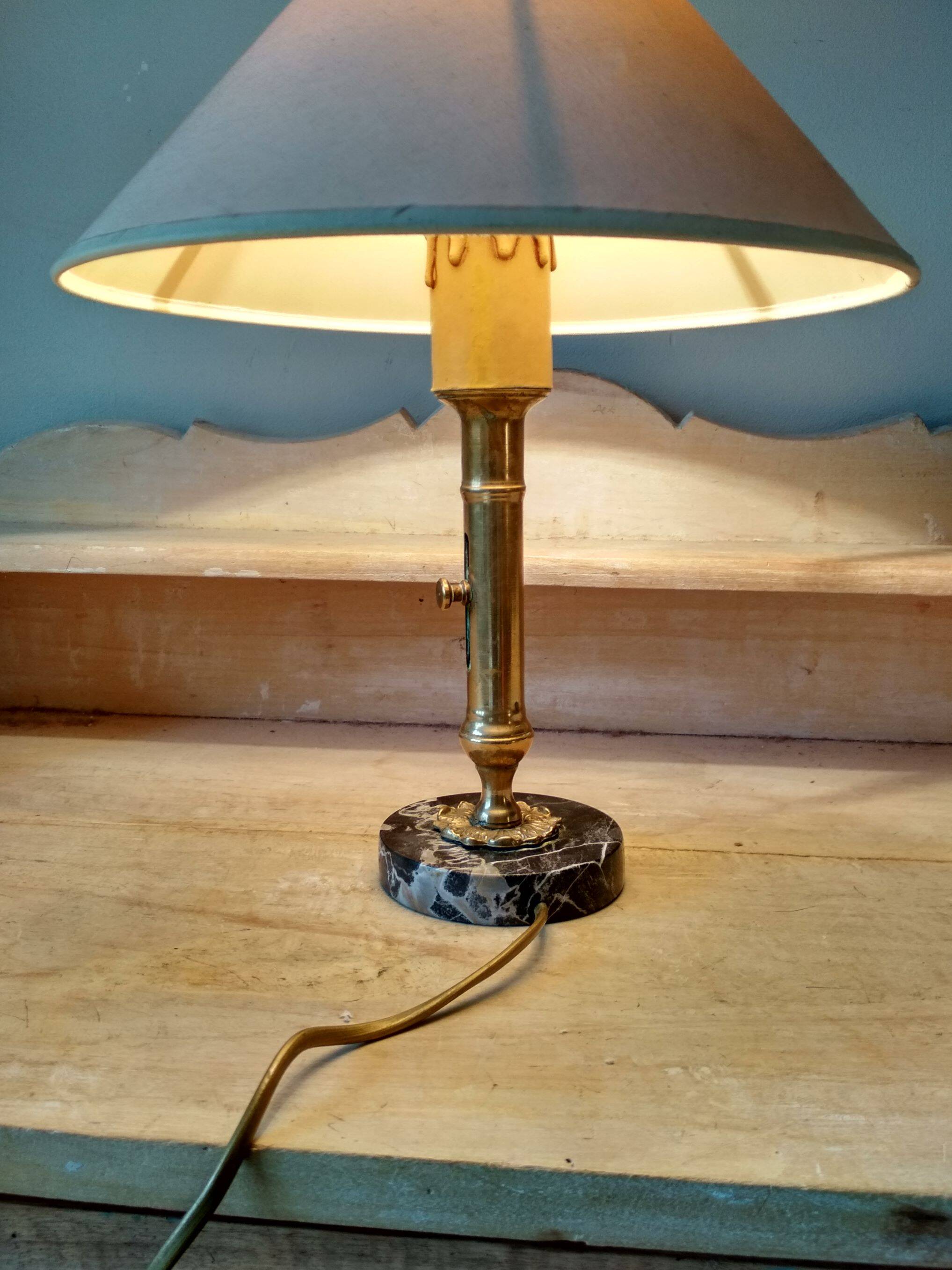 Table lamp with brass candle holder and marble base