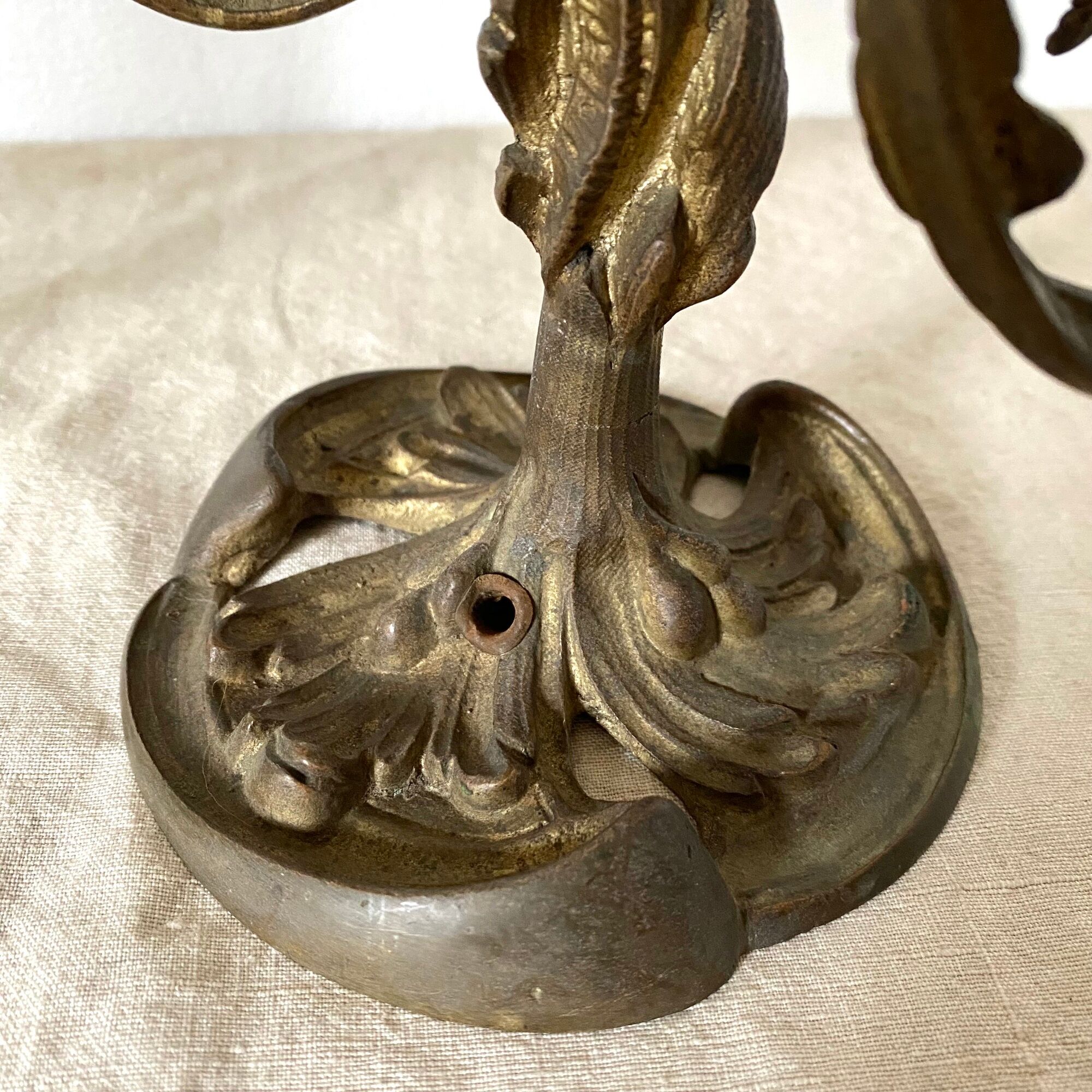 Pair of antique bronze candlesticks at the end of the table XIXth