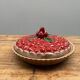 A trompe l’oeil strawberry pie dish