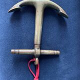 Bronze corkscrew in the shape of a boat anchor