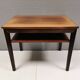 Nice side table in rosewood, probably Danish and from the 60s.