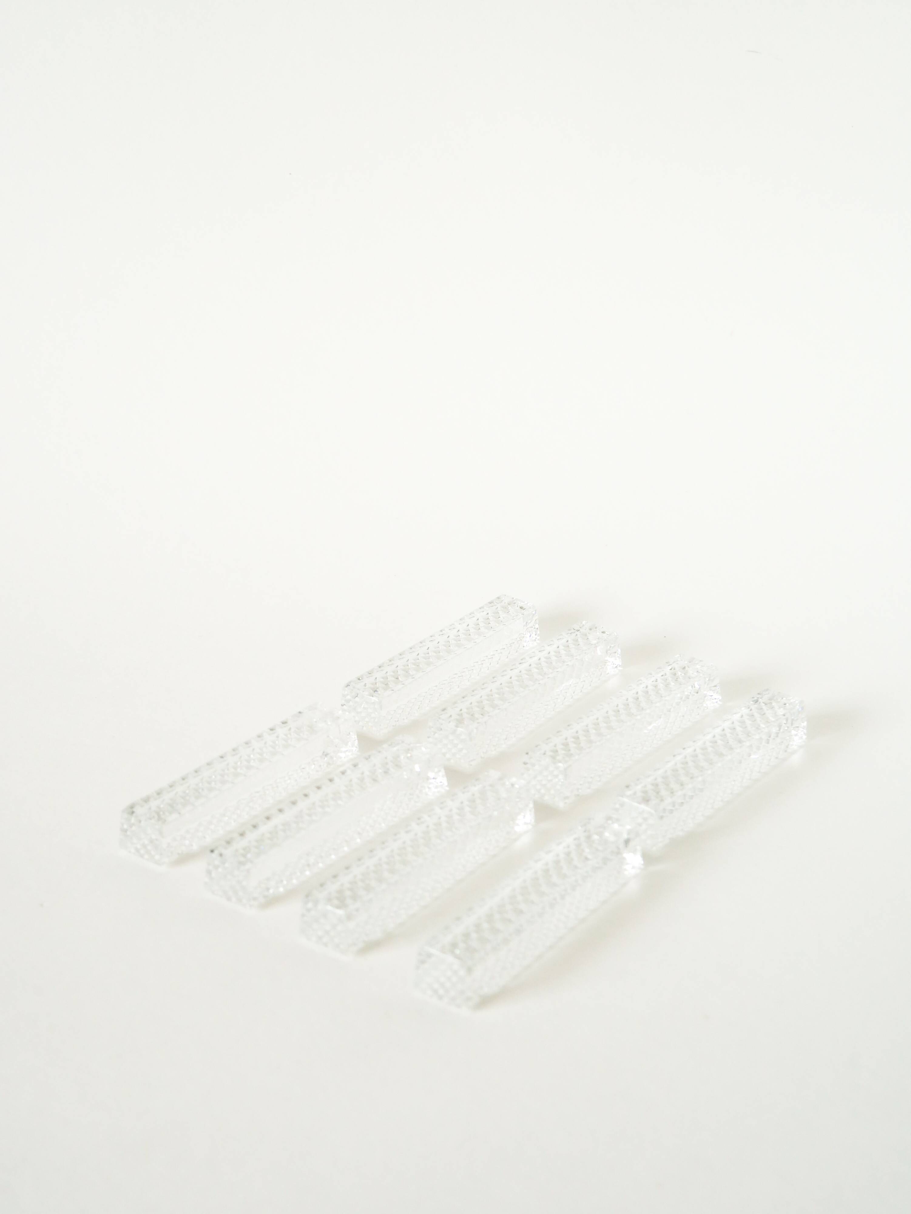 Set of 8 rectangular crystal knife rests, 1950