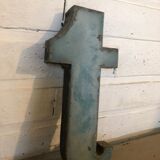 Blue sign letter "T"