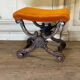 Tabouret en X, bois sculpté, XIXème siècle