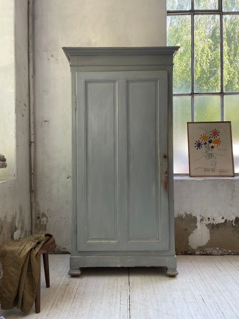 Blue patinated cap cabinet