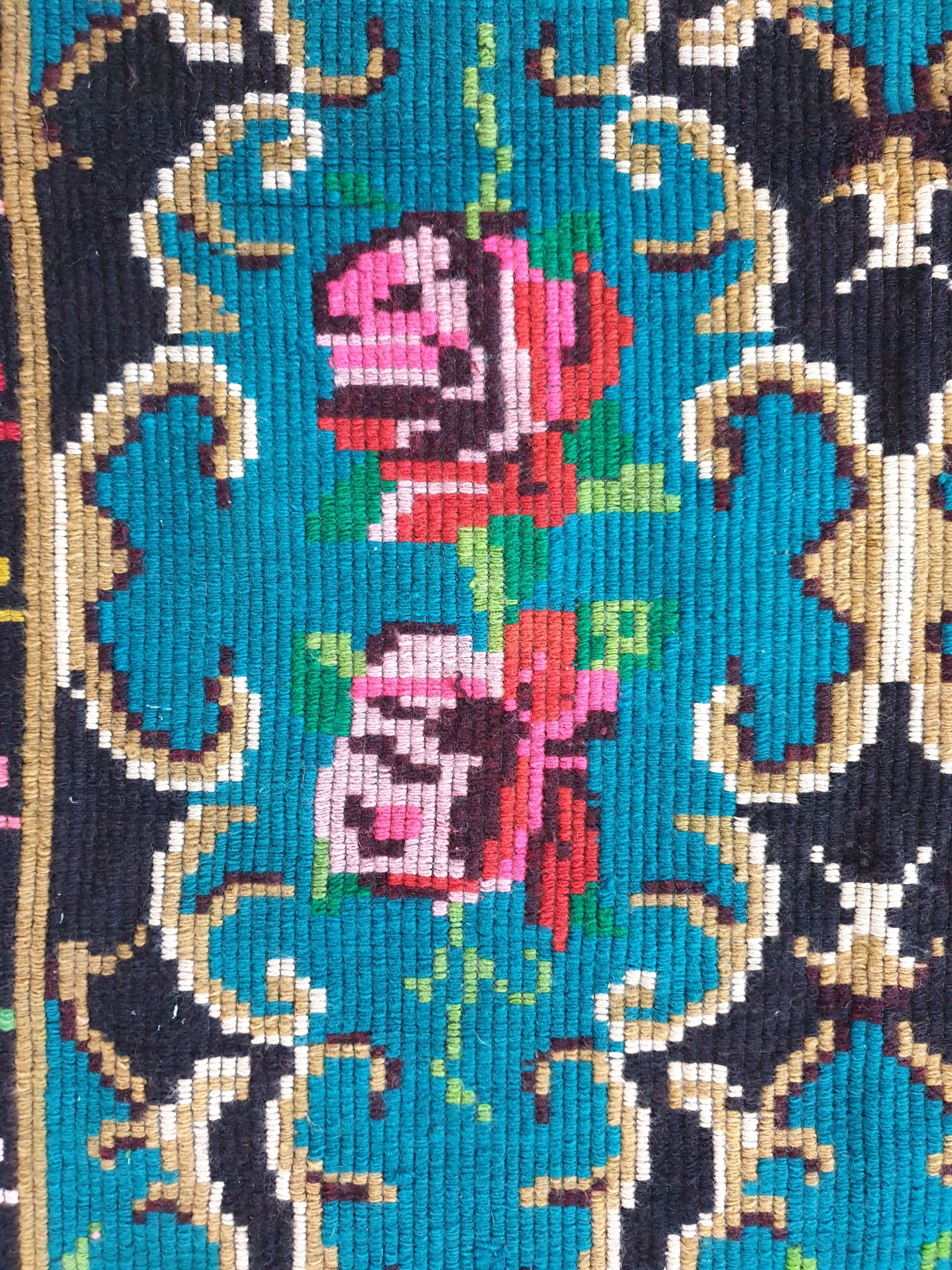 Bohemian blue handwoven carpet with roses made in Romania