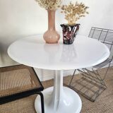 Round tulip-shaped dining table