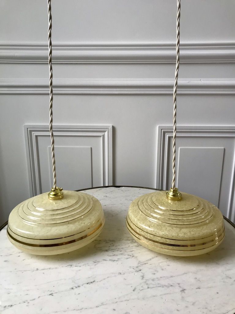 Pair of suspensions in yellow Clichy glass and golden border 40s-50s