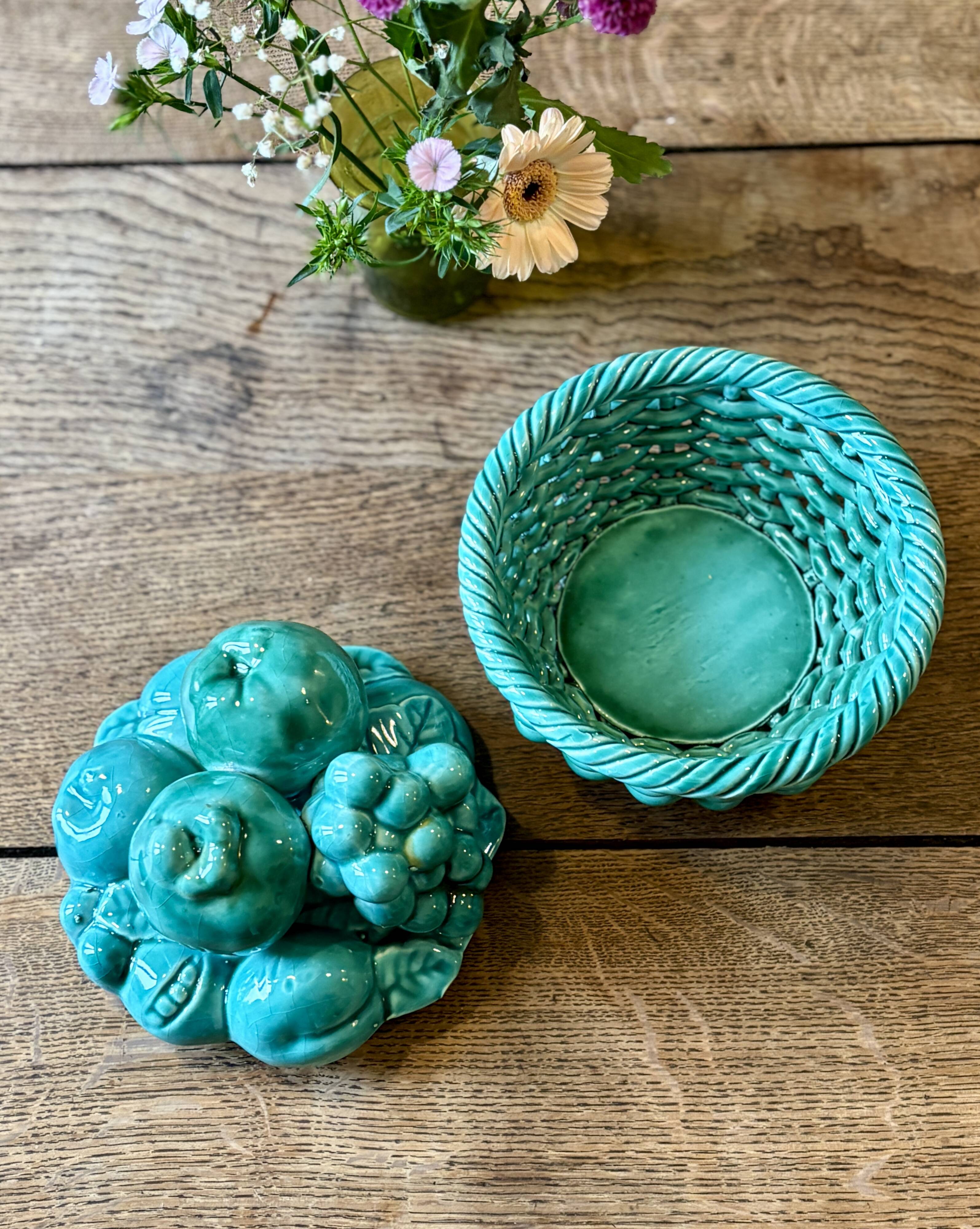 Vintage green earthenware plate/basket with fruit decorations.