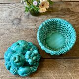 Vintage green earthenware plate/basket with fruit decorations.
