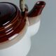 Teapot in beige and brown stoneware