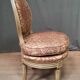 Chaise basse de style Louis XVI