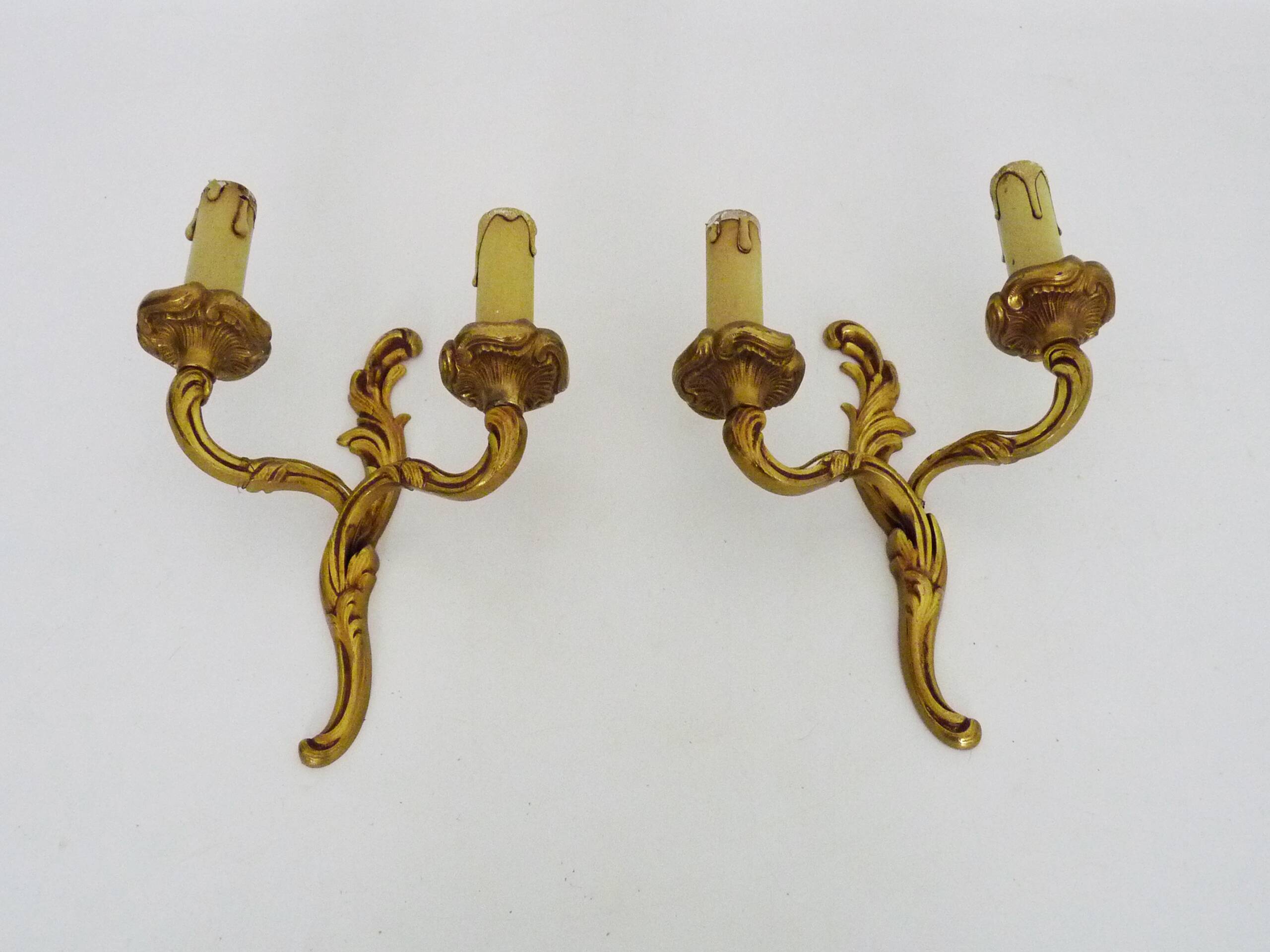Old pair of double wall sconces in bronze.