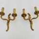 Old pair of double wall sconces in bronze.