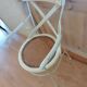 Canned chair with wooden and metal braces