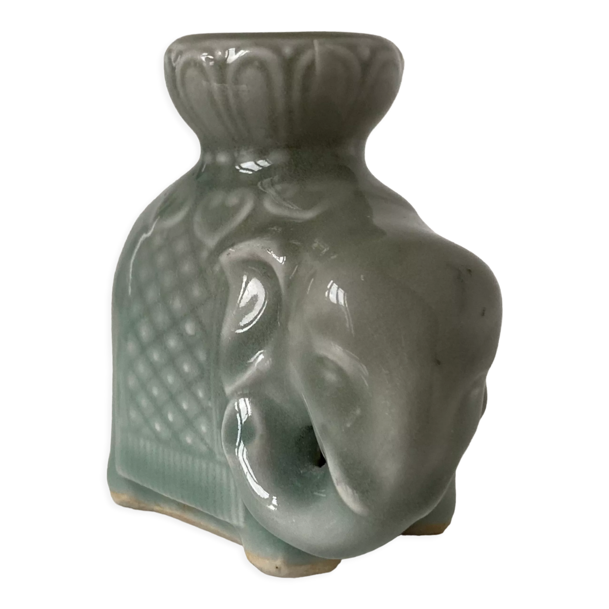 Porcelain candle holder and celadon cover in the shape of an elephant