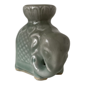 Porcelain candle holder and celadon cover in the shape of an elephant