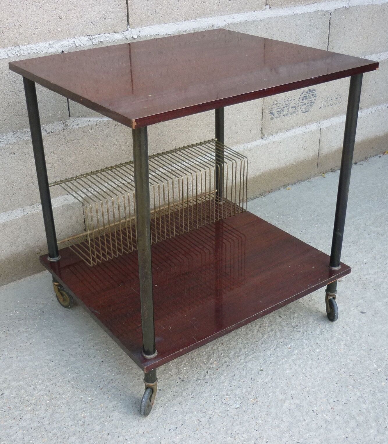Wooden vintage table on wheels