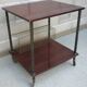 Wooden vintage table on wheels