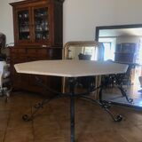 Travertine and wrought iron dining table