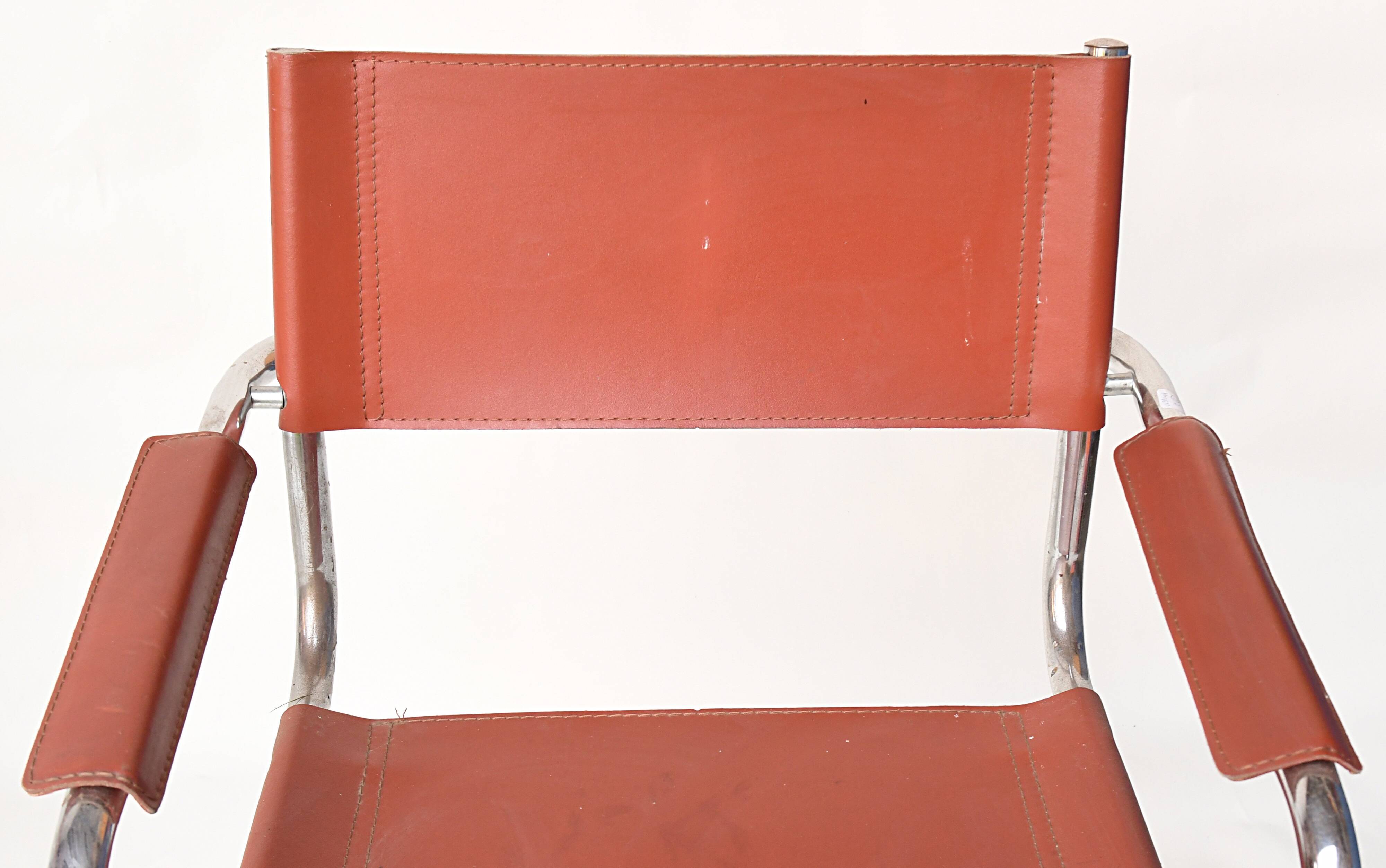 Pair of armchairs in brown saddle leather