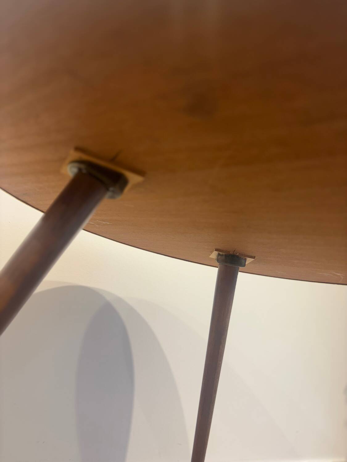 Vintage wooden coffee table with compass legs
