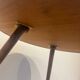 Vintage wooden coffee table with compass legs