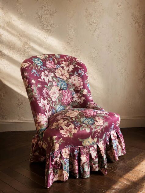 Antique floral upholstered armchair – traditional upholstery renovation.
