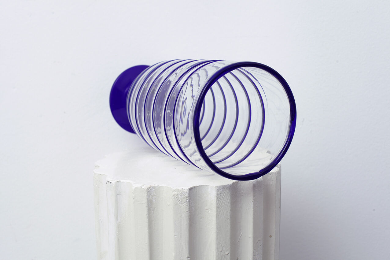 Transparent Murano glass vase and blue net