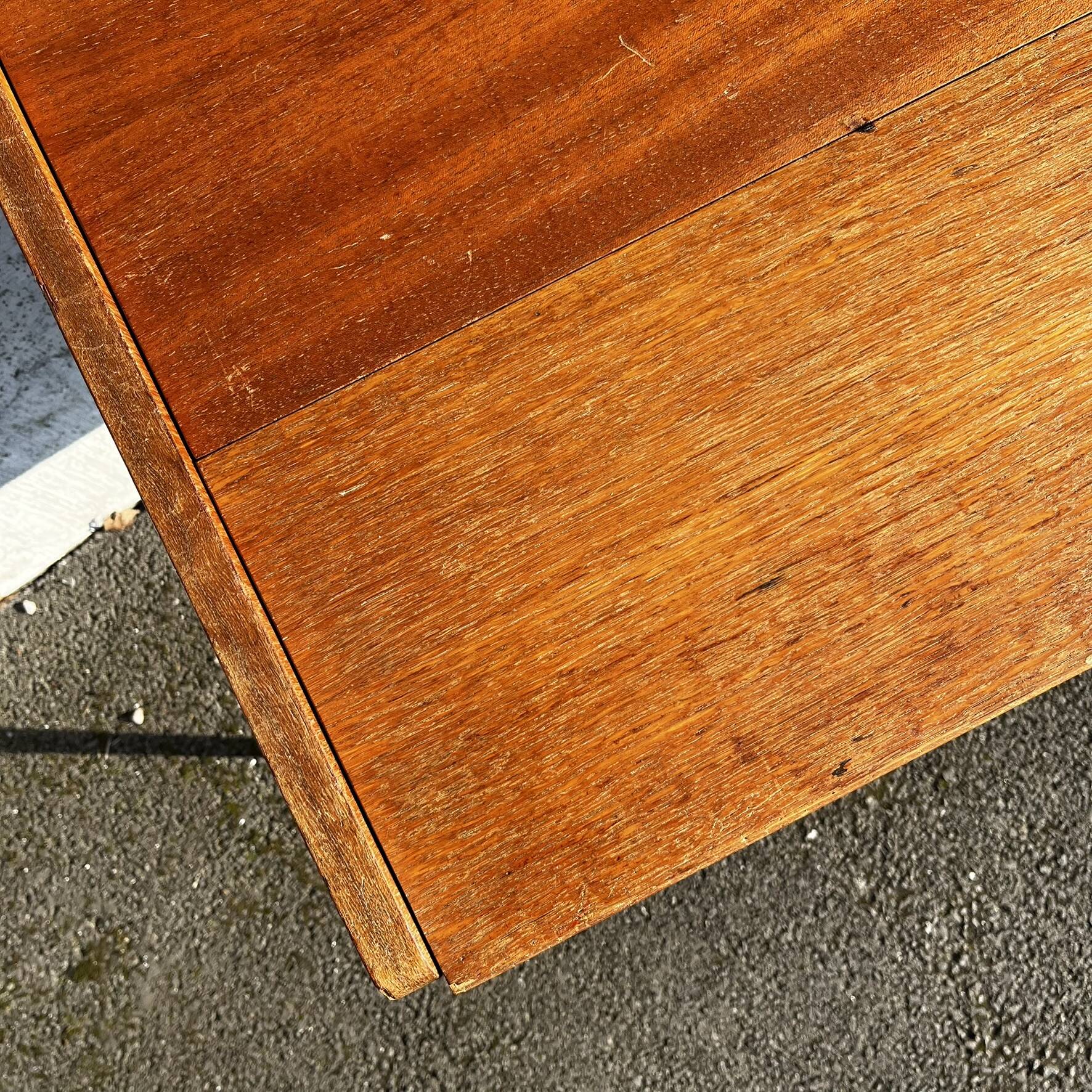 Vintage wooden console/desk with tapered legs.