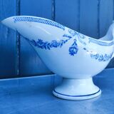 Old earthenware sauce boat