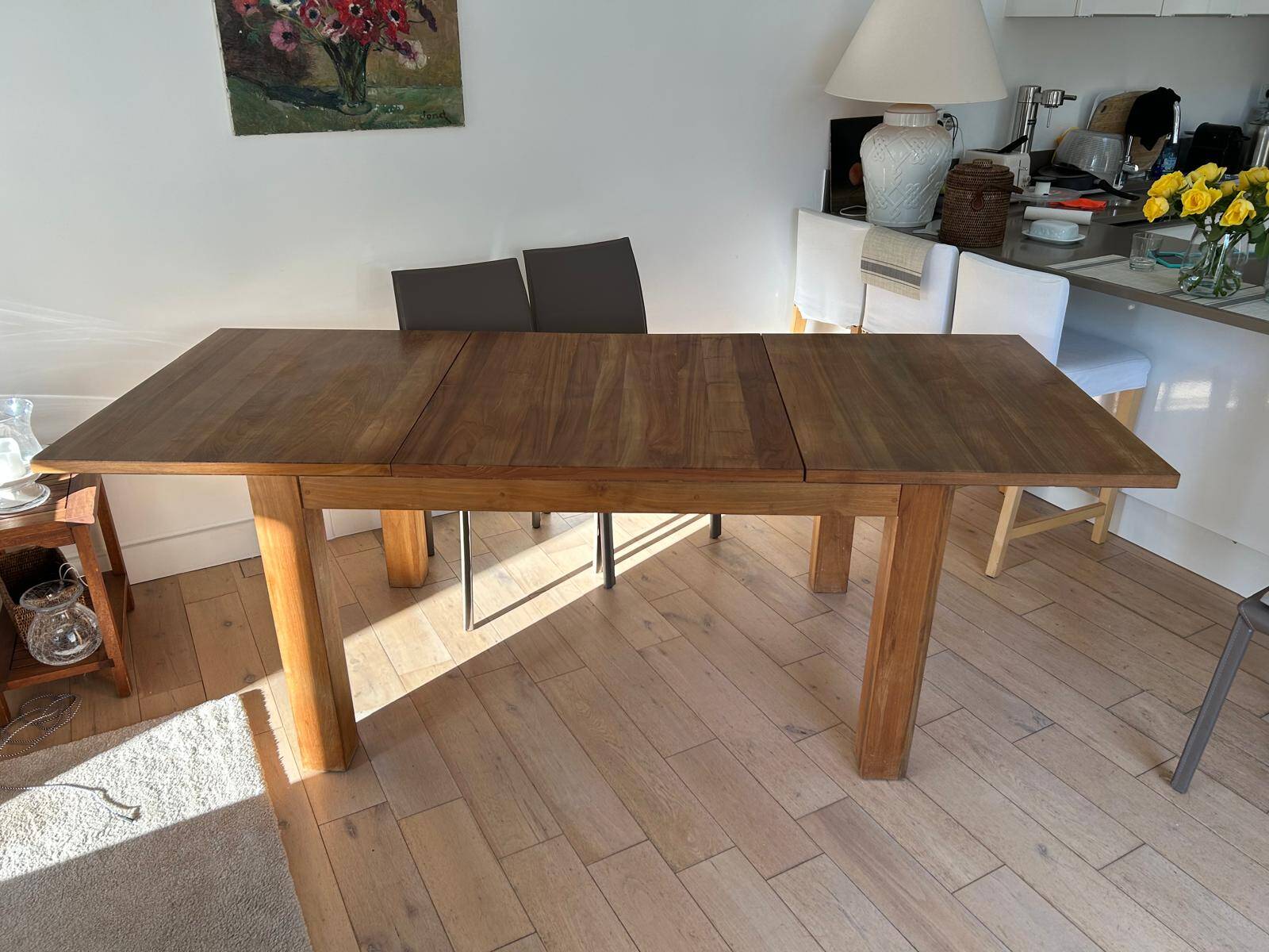 Ethnicraft teak dining table with slice extension