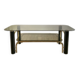 coffee table in smoked glass and black and gold metal from the 70s